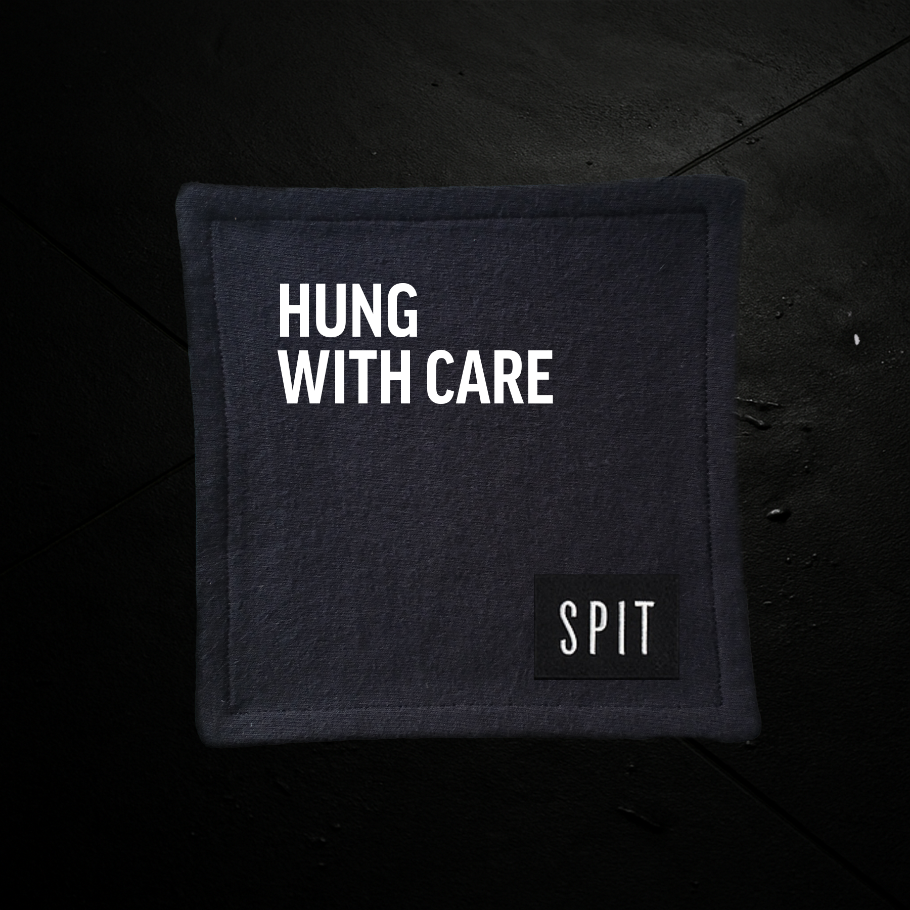 SPIT RAW – “Hung with Care” Towel
