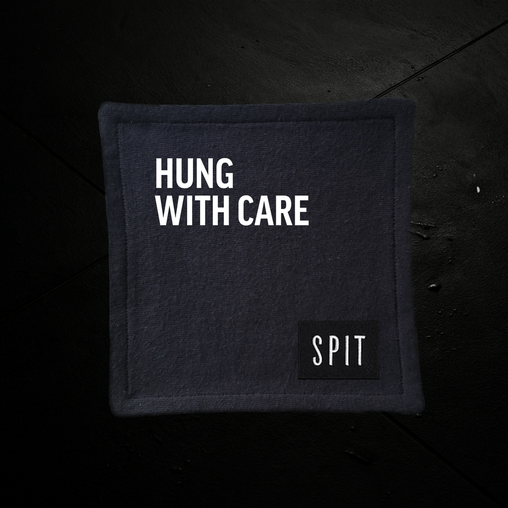 SPIT RAW – “Hung with Care” Towel